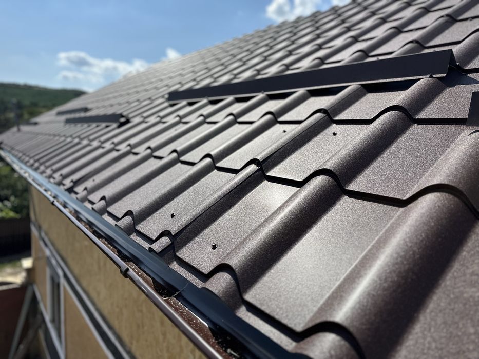 Reparatii acoperisuri montaj tigla metalica dulgherie mansarde terase