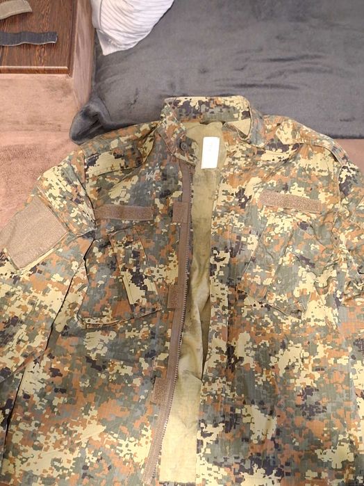 Камуфлажни дрехи