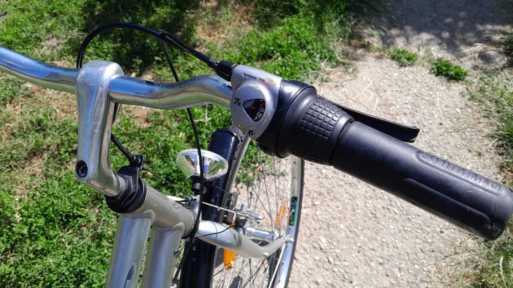 Bicicleta strada Pegasus,28 inchi,Aluminiu,7V Nexus,fr clasica,sa gel