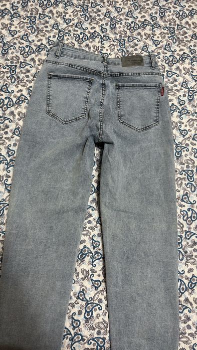 Джинсы-брюки женские