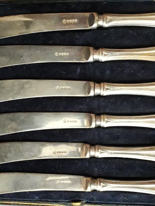 Vechi set cutite din argint