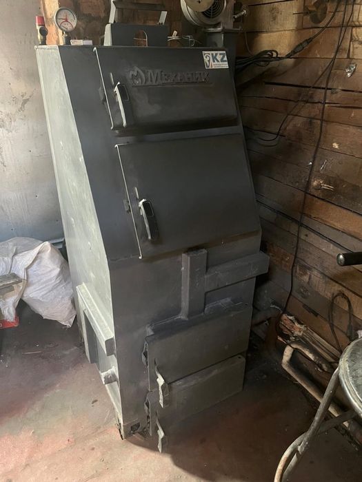 Котел длительного горения Механик