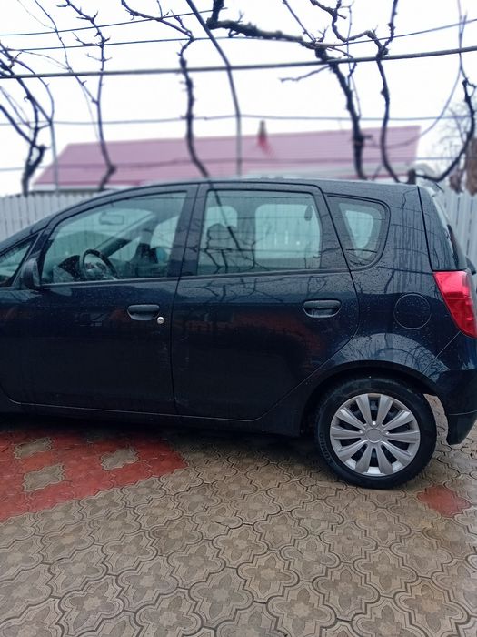 Vând Mitsubishi Colt din2012.