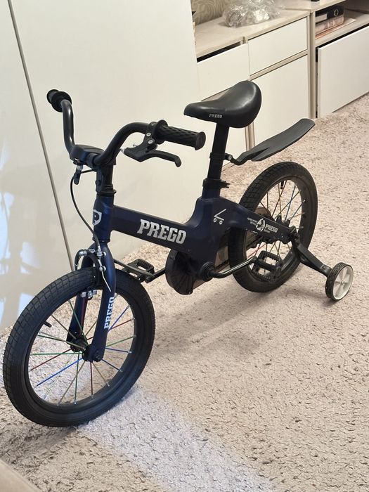 Детский велосипед PREGO, почти новый, с доп. колёсами
