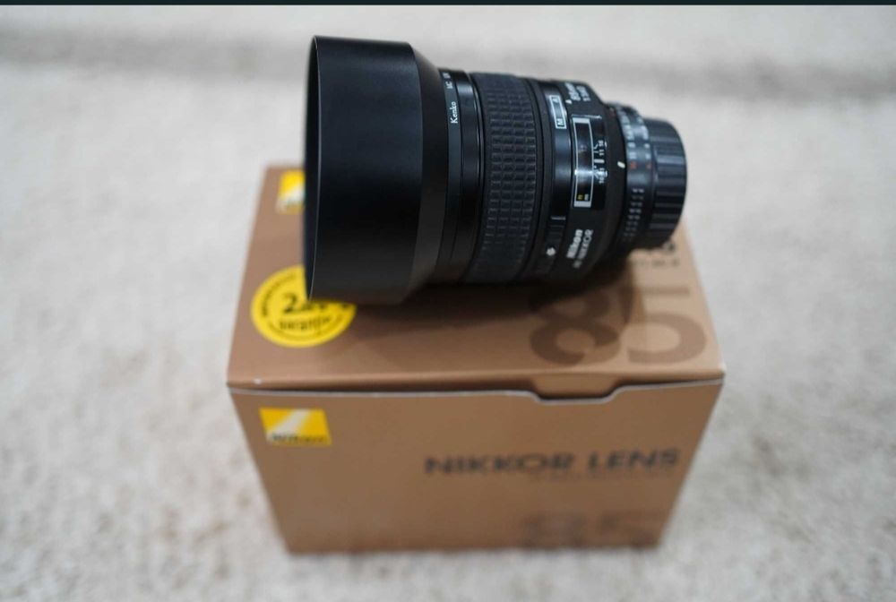 obiectiv nikon 85 1.4 , ca nou ,filtru Uv cadou