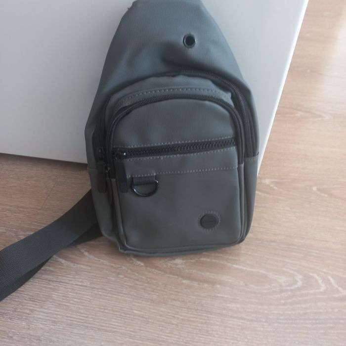 Барсетка  новая  серая