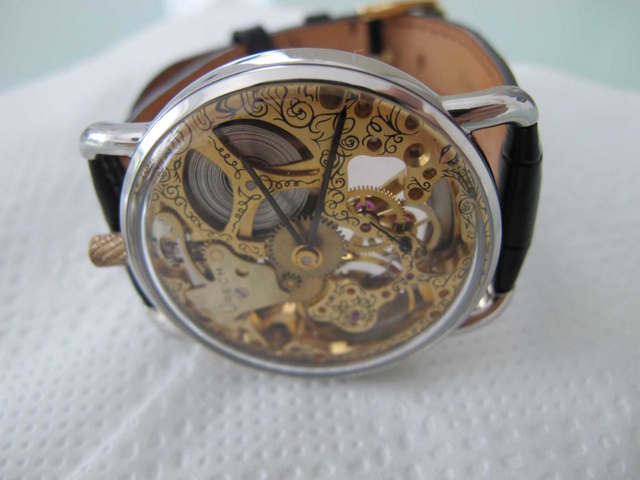 Urech Skeleton , mecanism ETA Unitas 6497 , nu Rolex , Breitling .