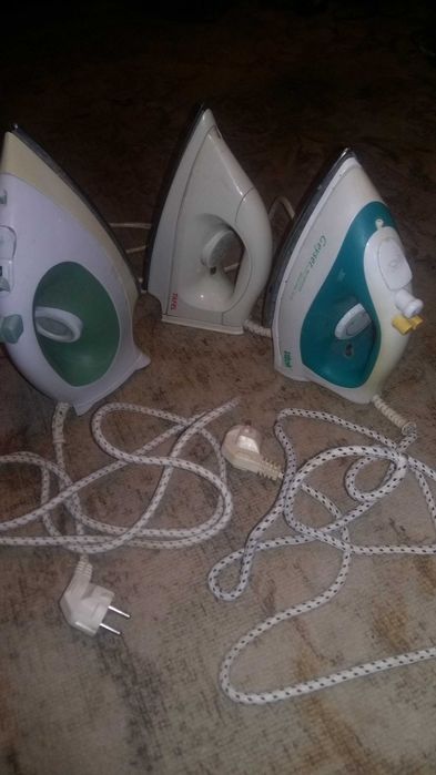 Гладильная доска и утюги