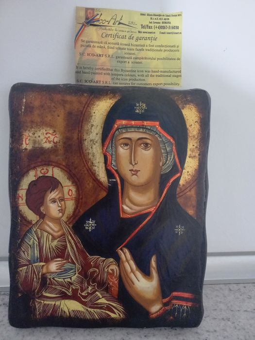 Icoana pictura pe lemn cu foita de aur "Maica Domnului cu Fiul" de la Patriarhia Romana noua cu certificat de garantie.
Dimensiune 18 x 20 cm