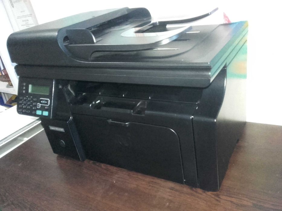 Като нов! Лазерен принтер,скенер и копир 3 в 1 HP LaserJet M1212nf MFP с мрежа и ADF
