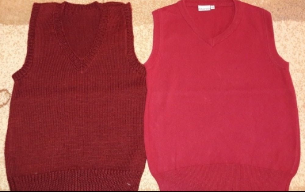 Жилеты вязаные