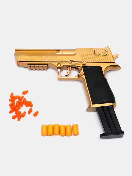 Игрушечный пистолет с вылетающими гильзами