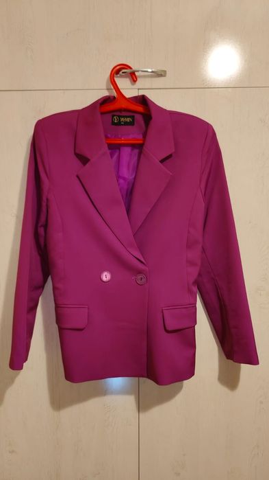 Продам женскую жилетку