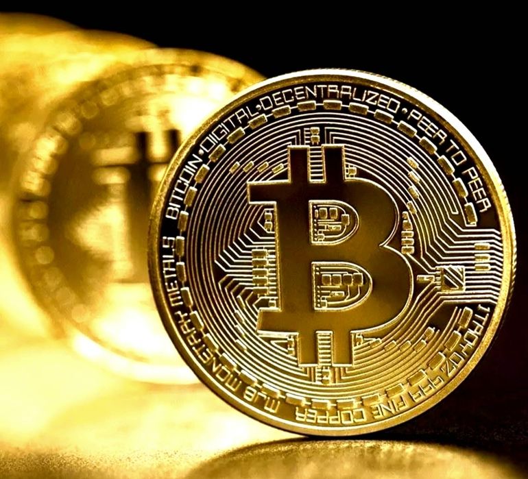 Монета Bitcoin..
