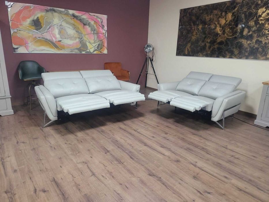 Светло сив комплект кожени дивани двойка и тройка Loreto с ел. релакс