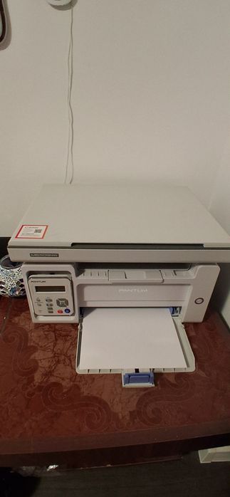 Imprimantă multifunctionala laser