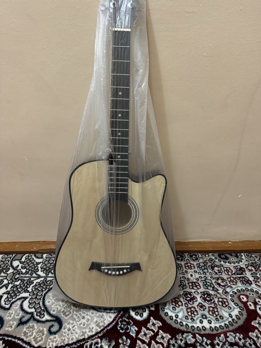 Янги гитара сотилади