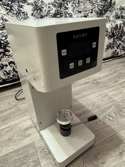 Машина для запечатывания банок