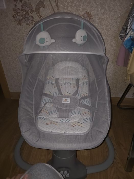 Продам детский шезлонг качели