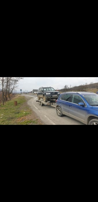 Ofer servicii de tractare auto,materiale,utilaje