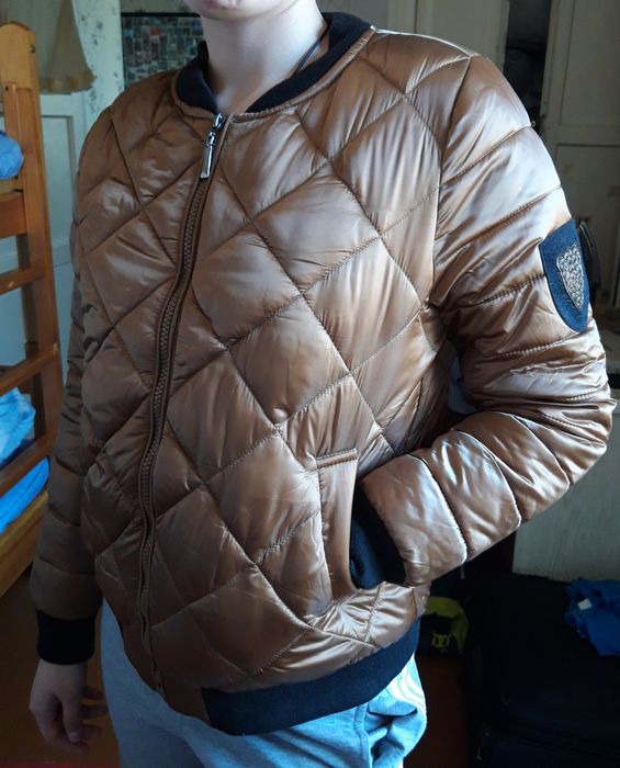 Куртка женская. Новая. Размер 42-44. Бронзового цвета