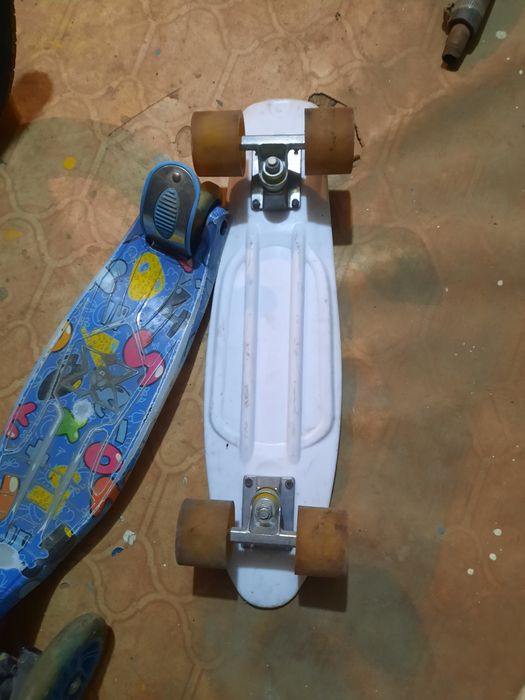 Самокат и скейт .