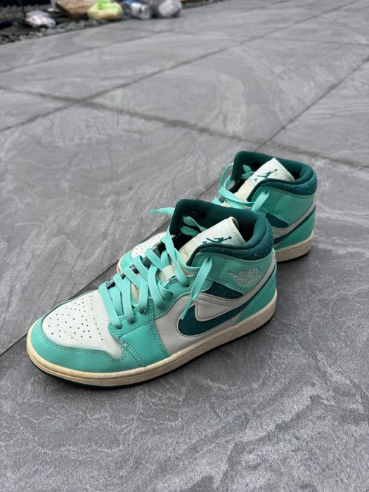 Air Jordan 1 Mid SE "Bleached Turquoise" sneakers.
