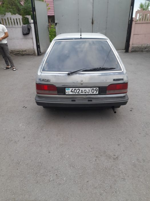 Мазда 1988 года 1.3объем
