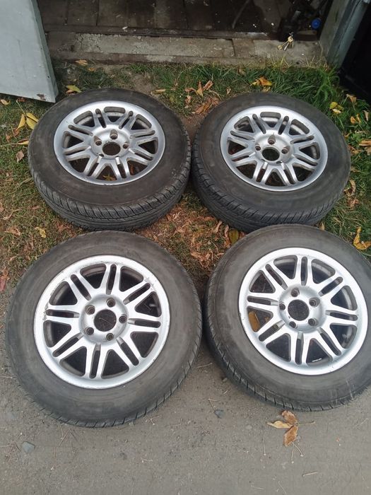 Продам титановые диски с шинами