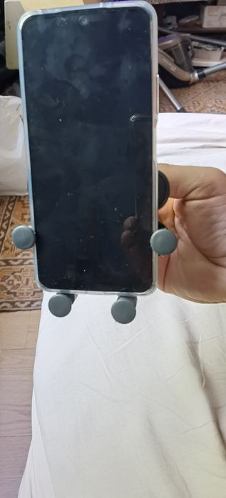 Две   Стойка за телефон