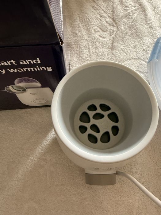 Електрически уред за затопляне на кърма/шишета/пюрета