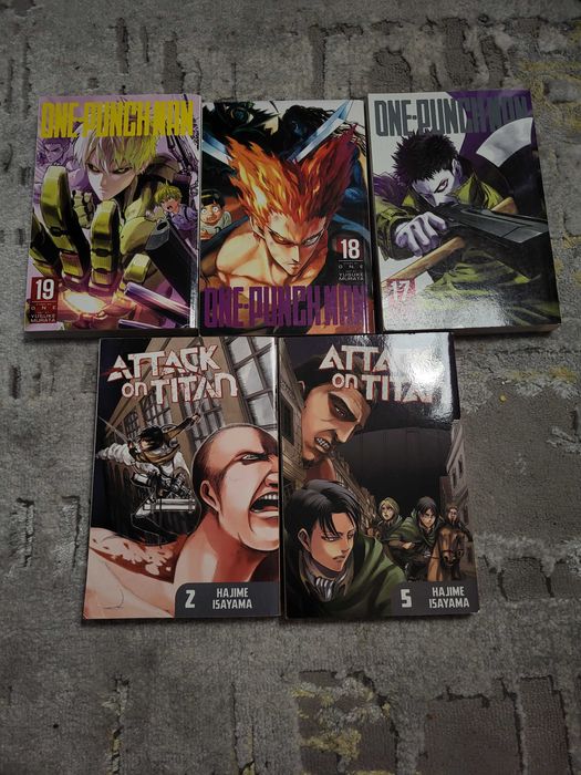 Manga one punch man și attack on titan noi.