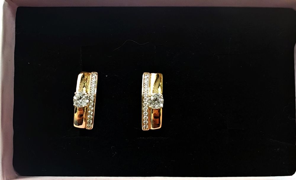 Продам серьги серебро и золото