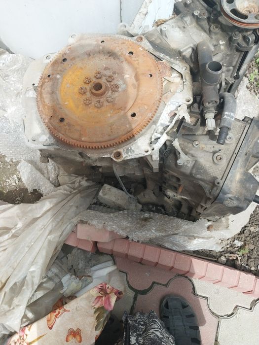 Двигатель б/у Мазда Трибьют