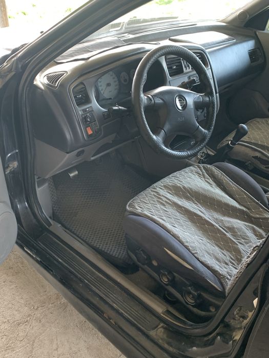 Nissan примера 2000 года