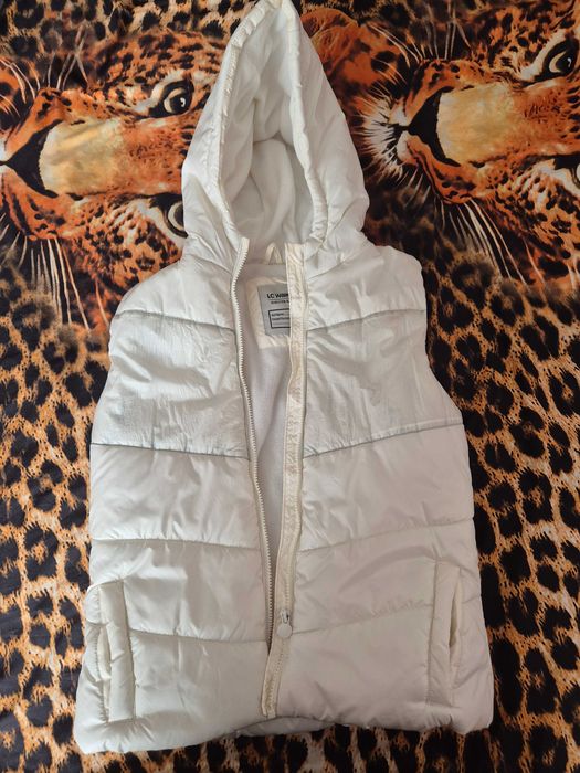 Теплая жилетка на девочку