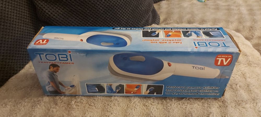 Fier de calcat vertical, cu abur