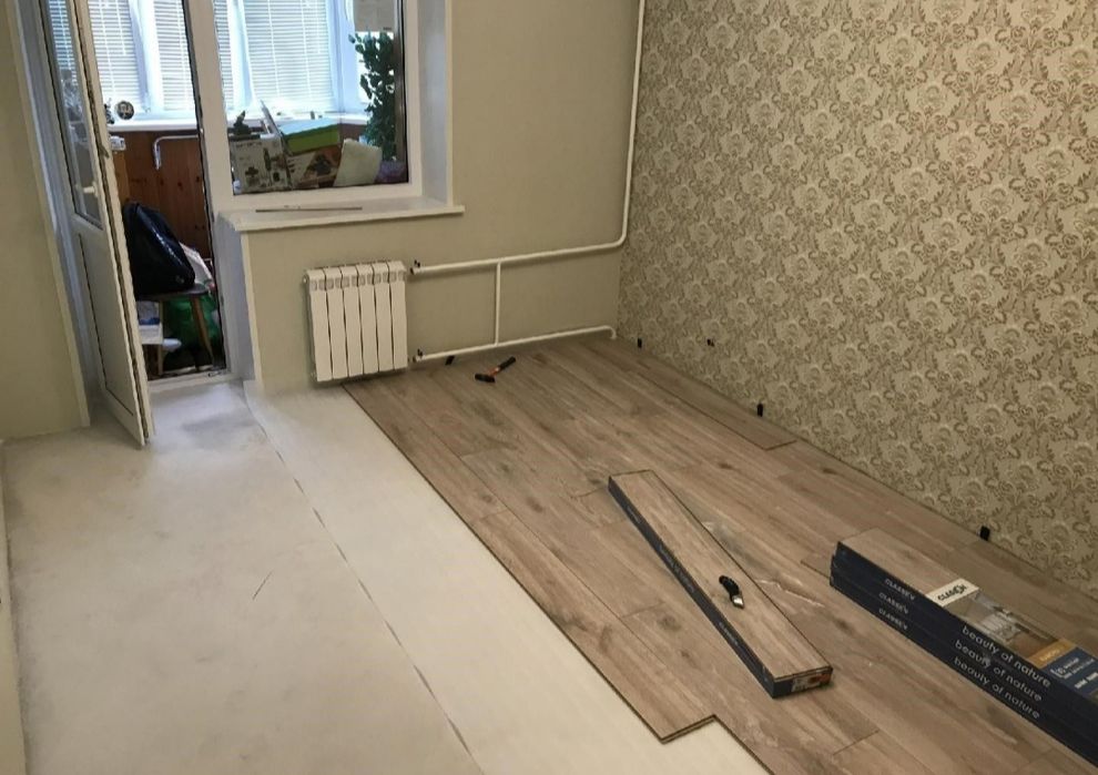 Настил Линолеума, укладка ламината, плинтус