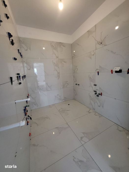 Apartament 2 camere decomandat + curte generoasă – construcție nouă