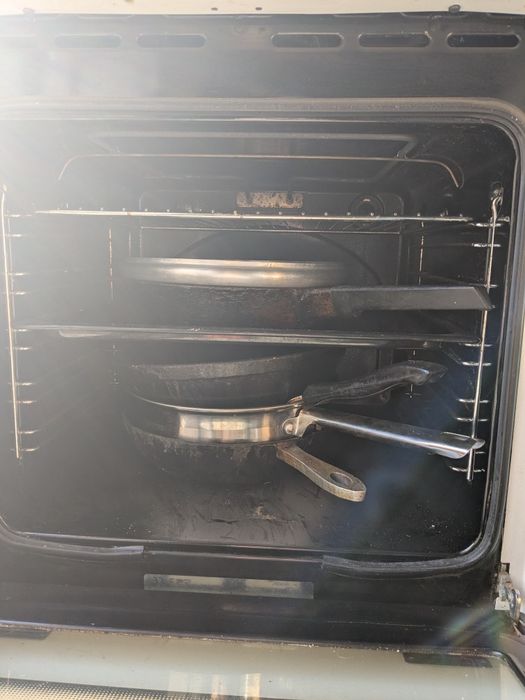 Электроплита с духовкой