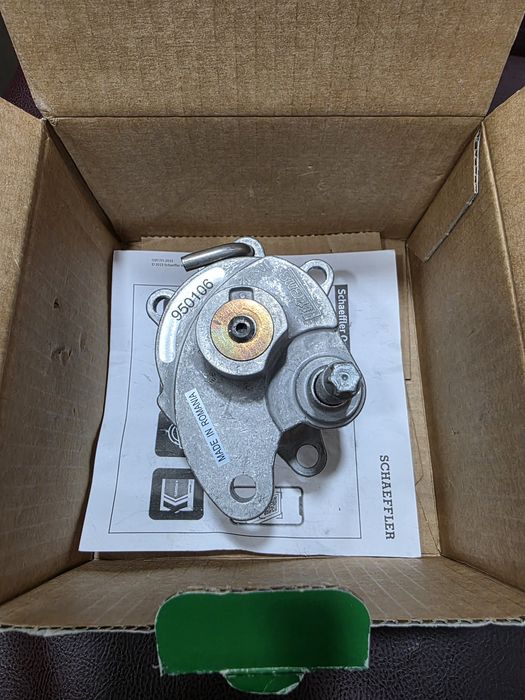 Натяжитель ремня w124