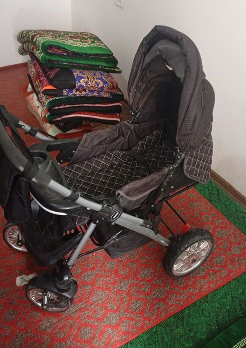 bolalar kolyaskasi katta holati yangi