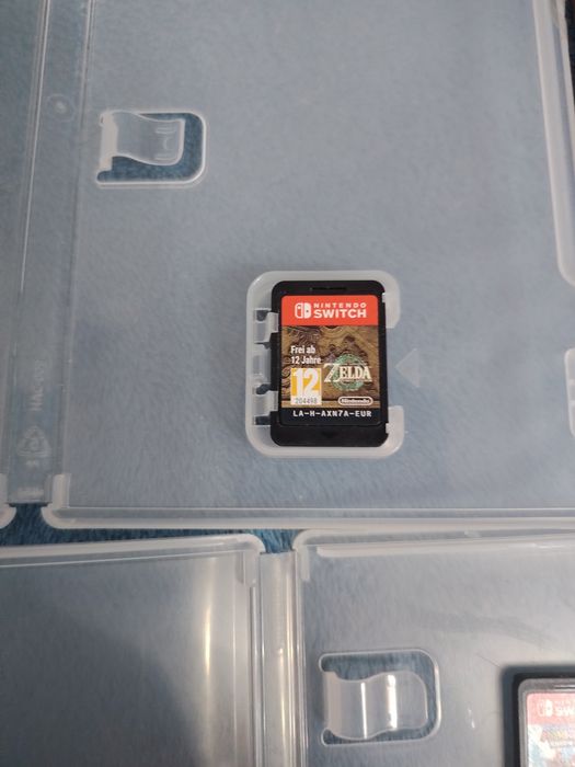 Zelda tears of the Kingdom , mario kart deluxe  nintendo switch