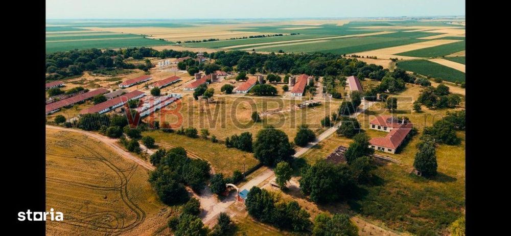 Ferma complet utilată – 30 ha teren comasat cu 11.500mp grajduri renov