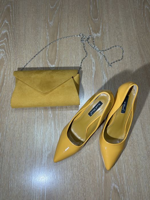 Елегантни обувки и чанта в цвят горчица, носени веднъж