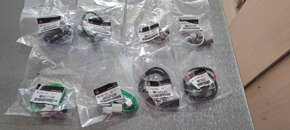 Датчики включения переднего моста и раздатки Mitsubishi