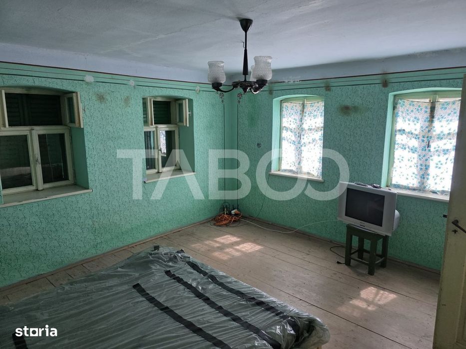 Casa si teren 1800 mpu cu utilitati si posibilitate de extindere