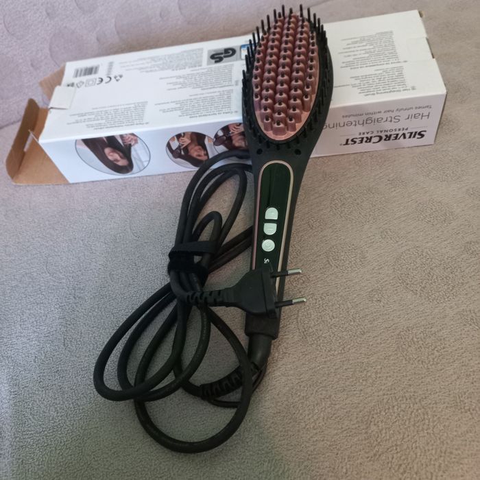 Електрическа четка за изправяне на коса