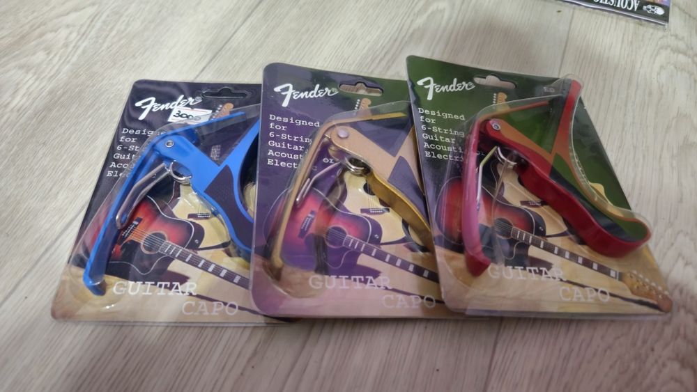 Каподастр гитара