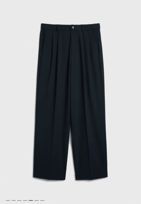 Широкие брюки с защипами